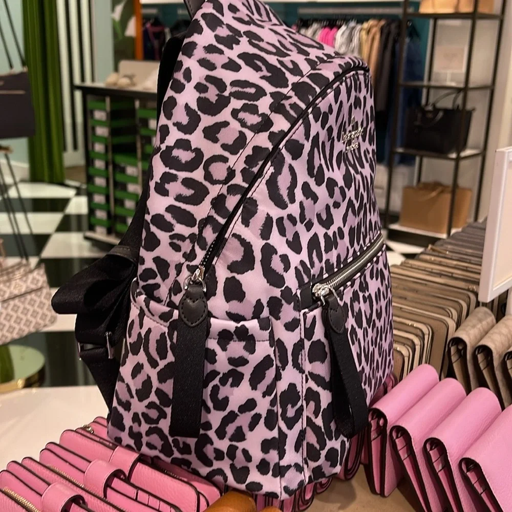 Kate Spade Chelsea Spotted Leopard Print Medium Backpack
Violet Mist
NWT - Picture 10 of 16
